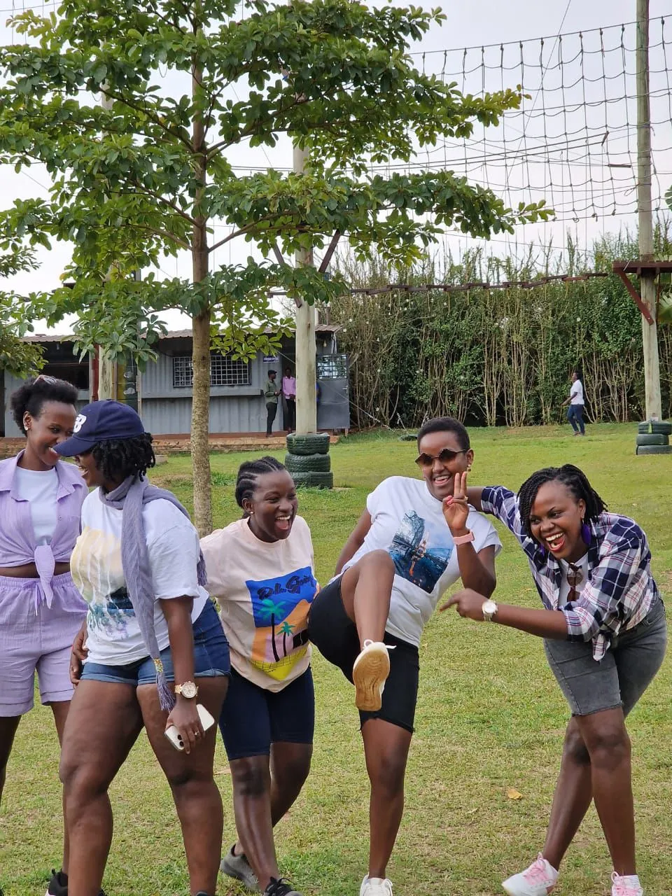 Miles with happy clients exploring Kampala